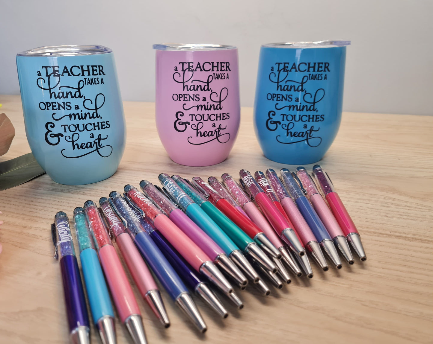 A Teacher Touches a Heart Tumbler