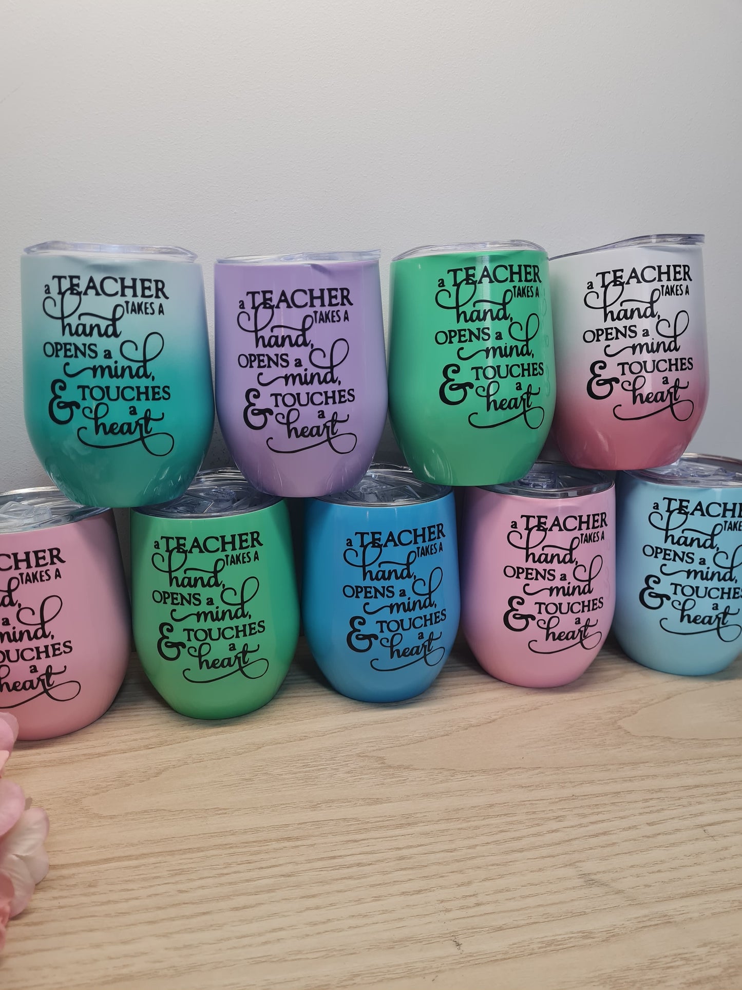A Teacher Touches a Heart Tumbler