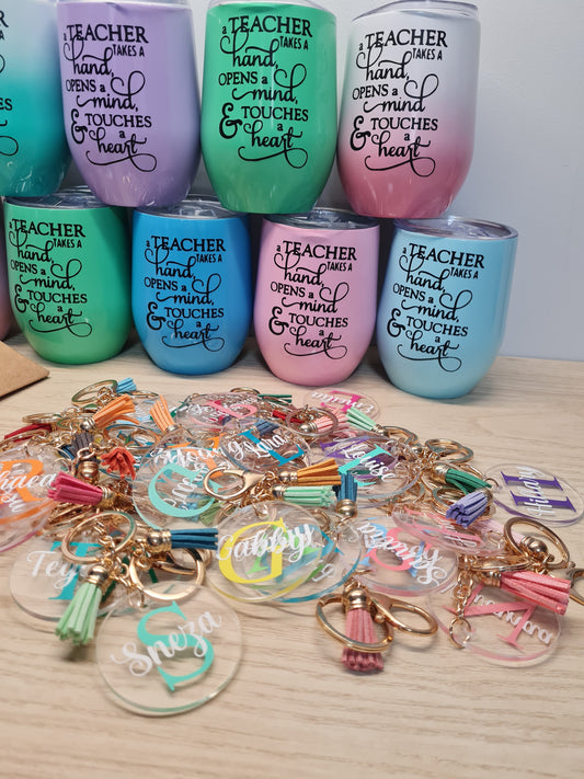 A Teacher Touches a Heart Tumbler