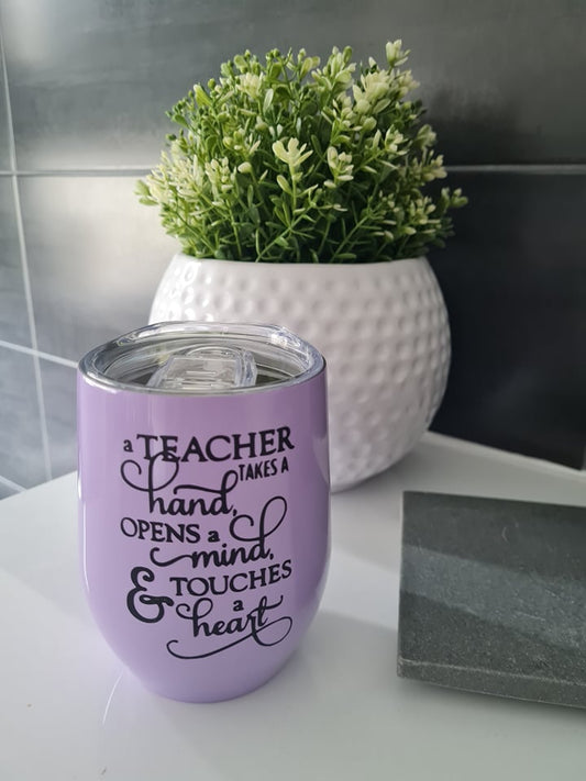 A Teacher Touches a Heart Tumbler